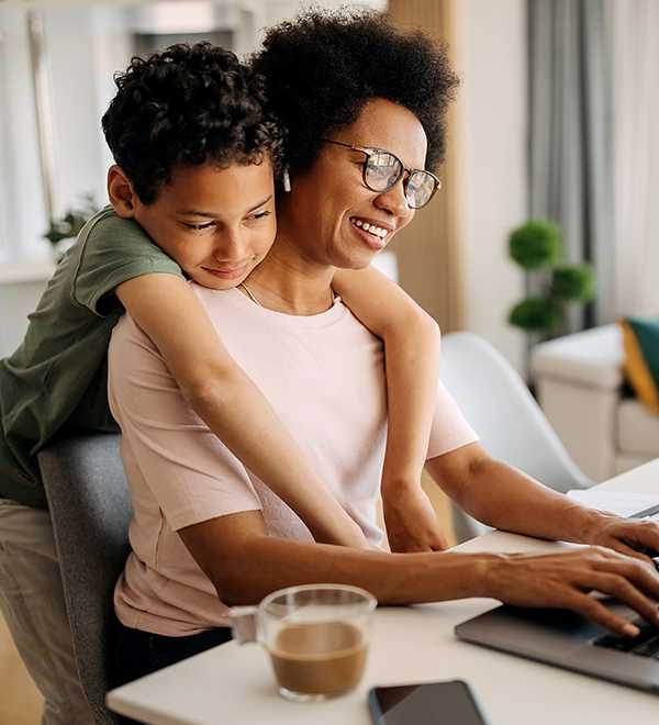 woman working with son